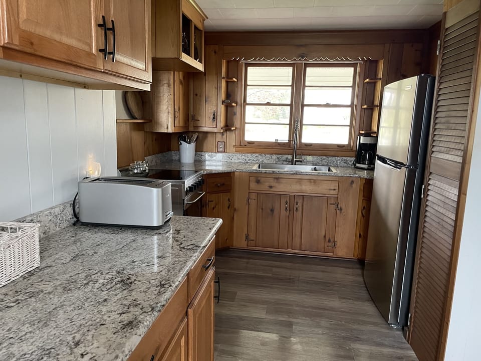 Kitchen area. Note kitchen does not have a dishwasher. 