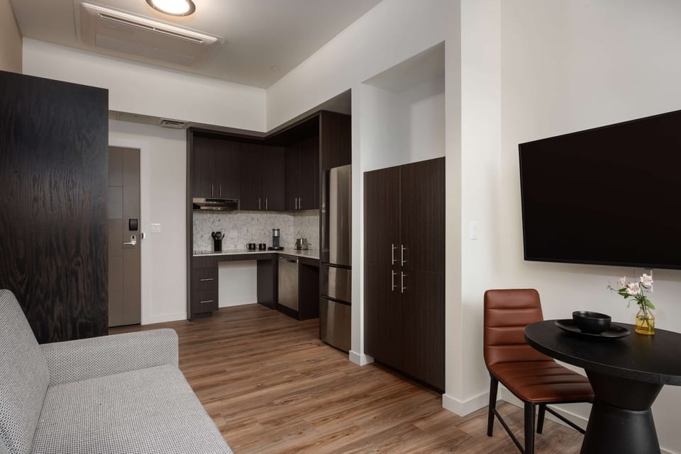 Room, 1 King Bed, Kitchenette (Mobility, Roll-In Shower) | Private kitchen | Mini-fridge, coffee/tea maker, highchair