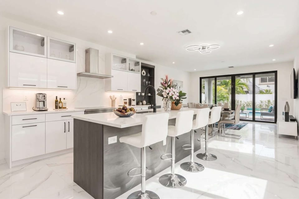 Have a few drinks at the kitchen island while watching the designated chef in action.