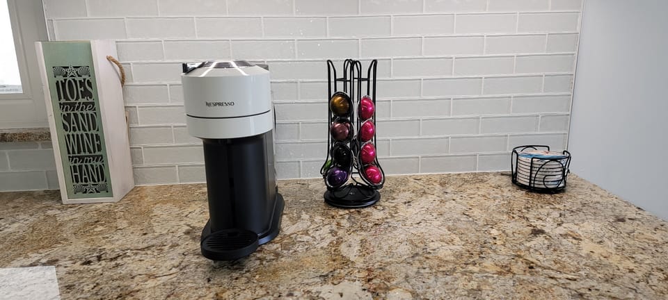 Nespresso coffee  machine with starter pods, and regular coffee maker provided