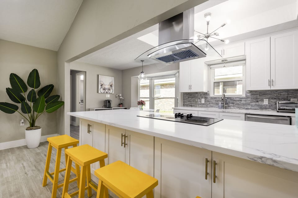Kitchen island with bar stools