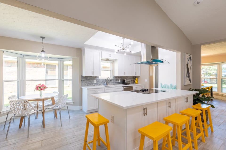 Kitchen island with bar stools