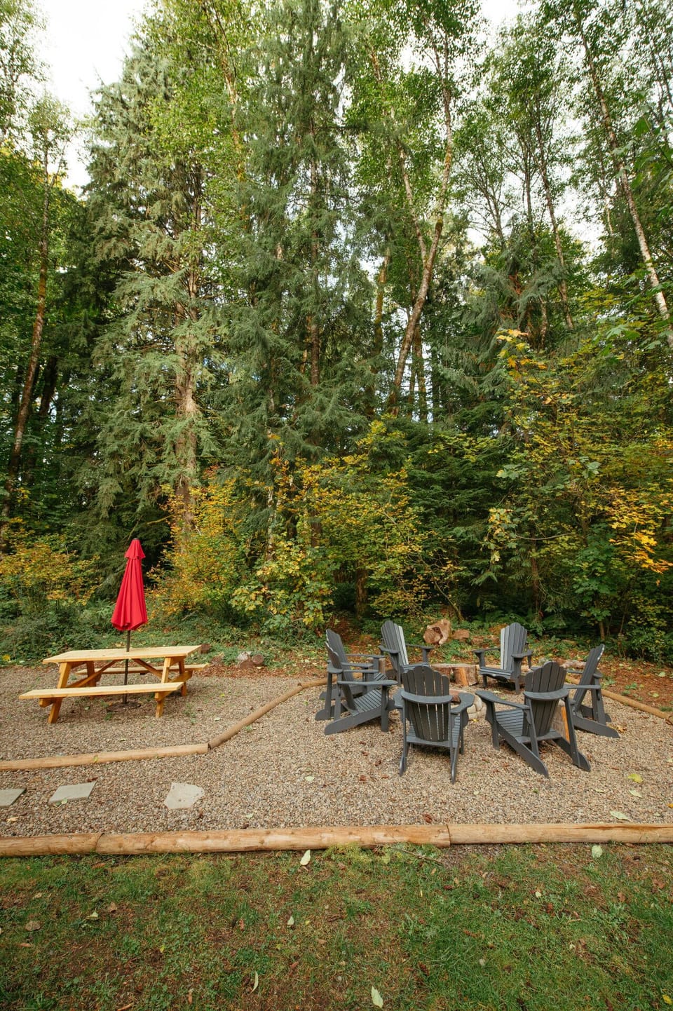 Fenced-in forested backyard with over an acre to enjoy. Have a bonfire or plan a backyard bbq, maybe just walk the trail to the hammock to read a book.