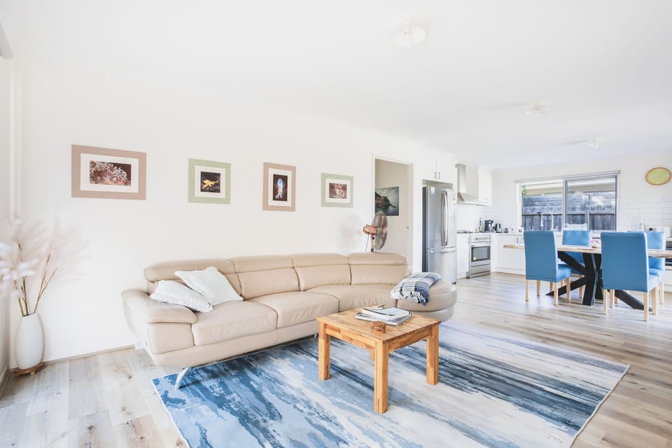Living area with comfortable lounge, smartTV, fan, airconditiong and more