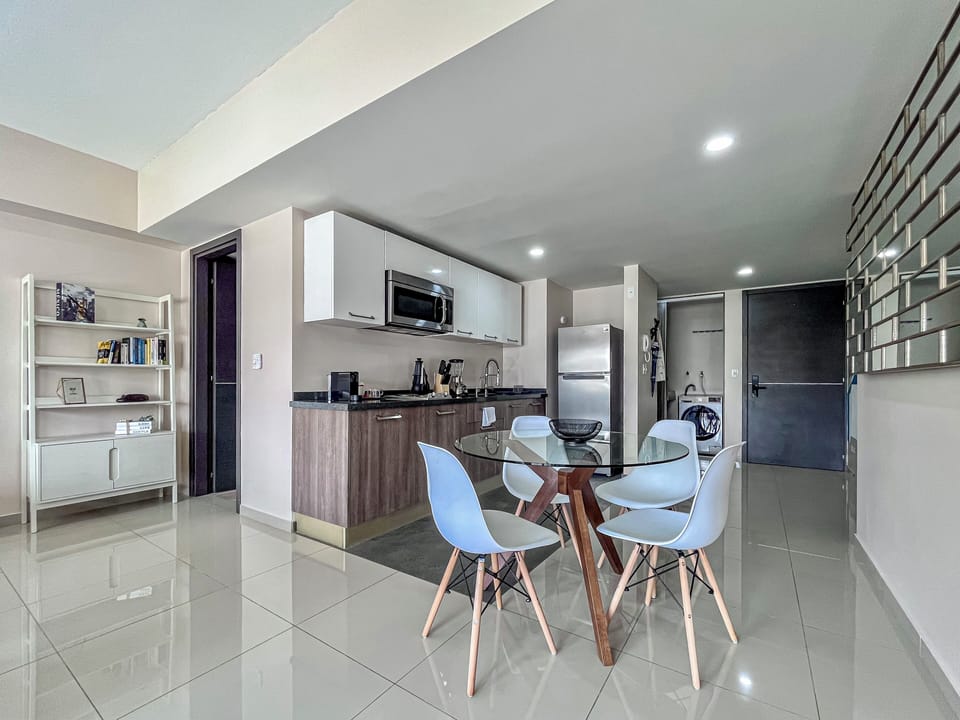 Business Apartment, Pool Access | Private kitchen | Full-size fridge, microwave, espresso maker, coffee/tea maker