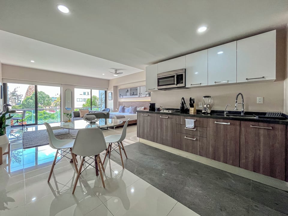 Business Apartment, Pool Access | Private kitchen | Full-size fridge, microwave, espresso maker, coffee/tea maker