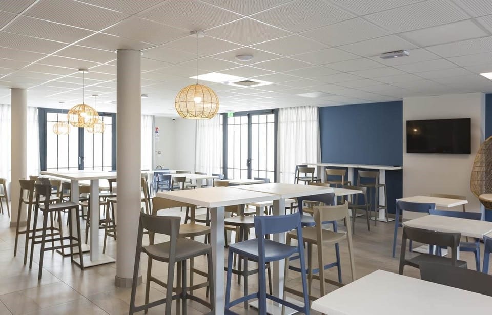 Grab breakfast for a fee in the breakfast room.