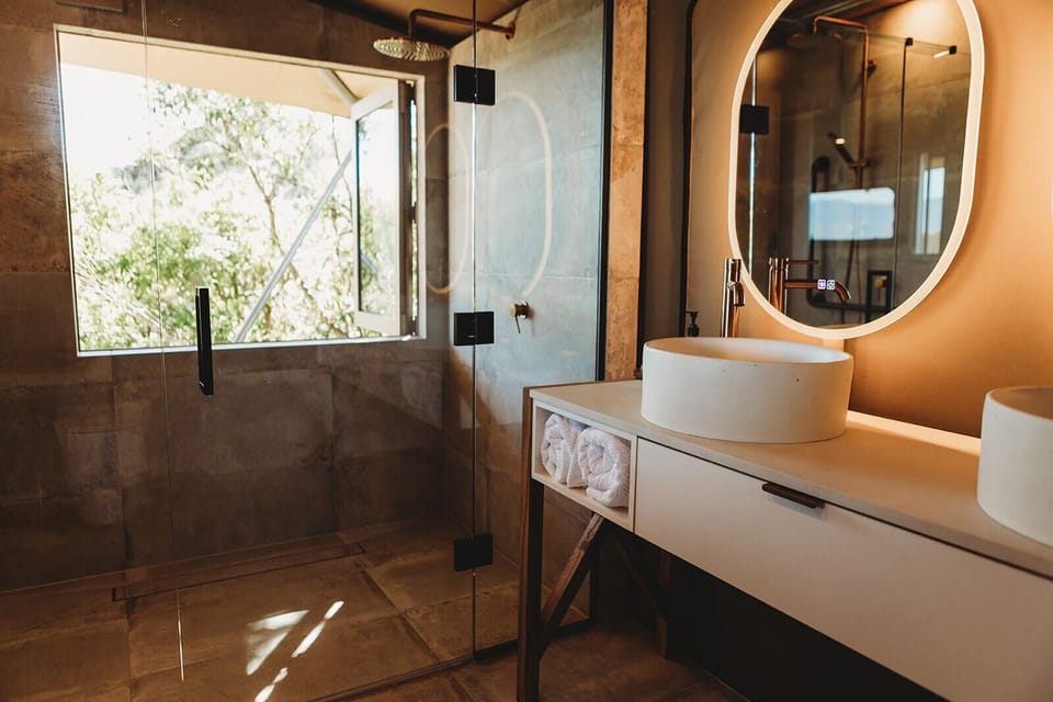 Luxury Tent | Bathroom | Shower, rainfall showerhead, designer toiletries, hair dryer