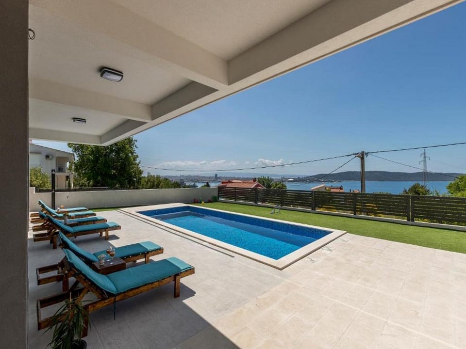 Villa (Four bedroom villa with swimming pool) | Pool | Outdoor pool, pool umbrellas, sun loungers