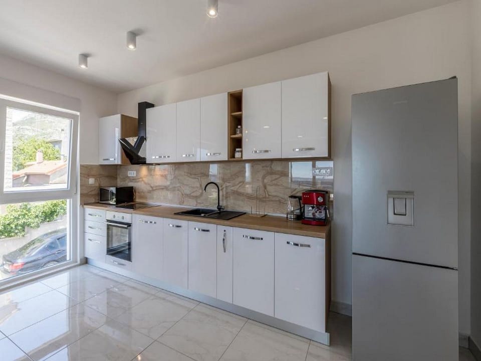 Villa (Four bedroom villa with swimming pool) | Private kitchen | Fridge