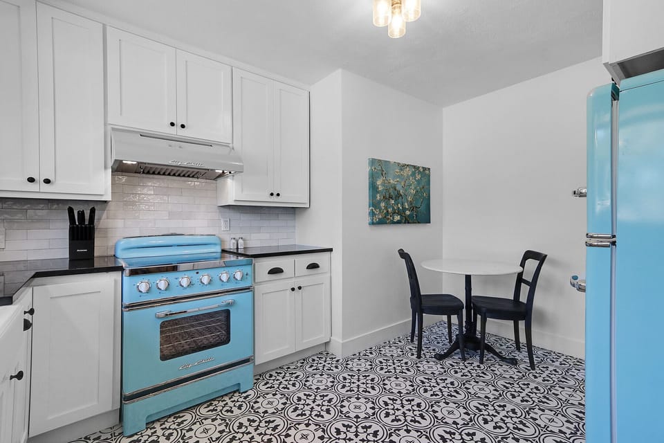 The dining room then leads into the full kitchen