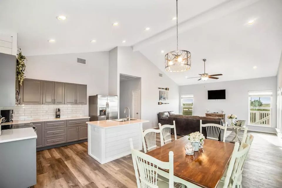 The house features a full kitchen with an island