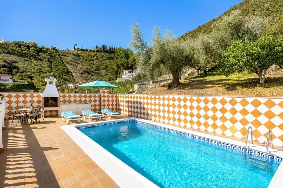 Private pool, terrace, and garden with sea views