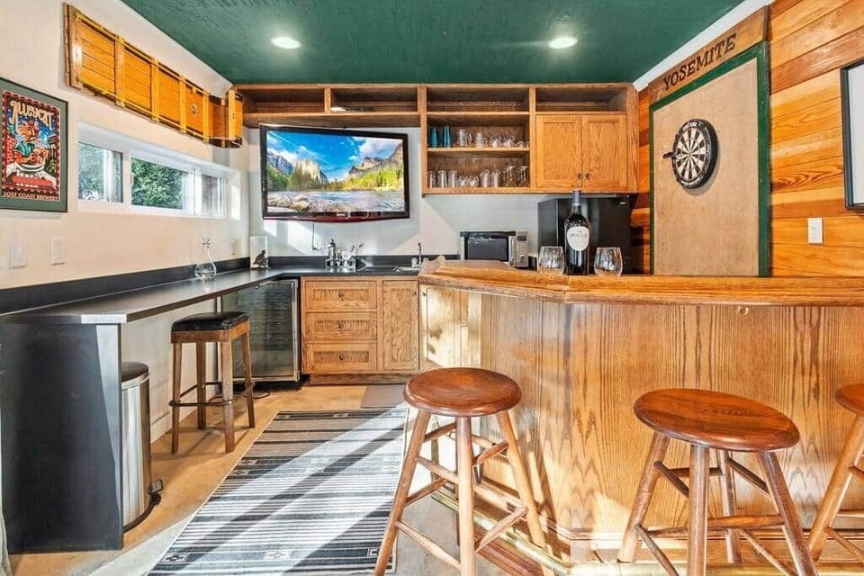 Pull up a stool while you enjoy the karaoke and darts.