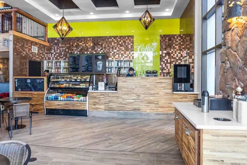 Start your day at the on-site coffee bar, one of several on-site dining options you will find in the complex.