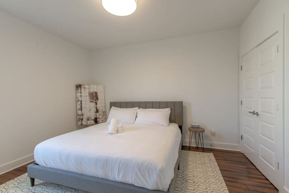 A bedroom with warm tones and careful styling is a genuine comfort after a day in Nashville.