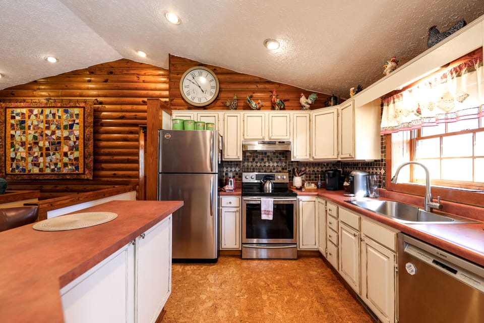 Full size refrigerator, range and oven, and dishwasher, all sizes pots and pans!
