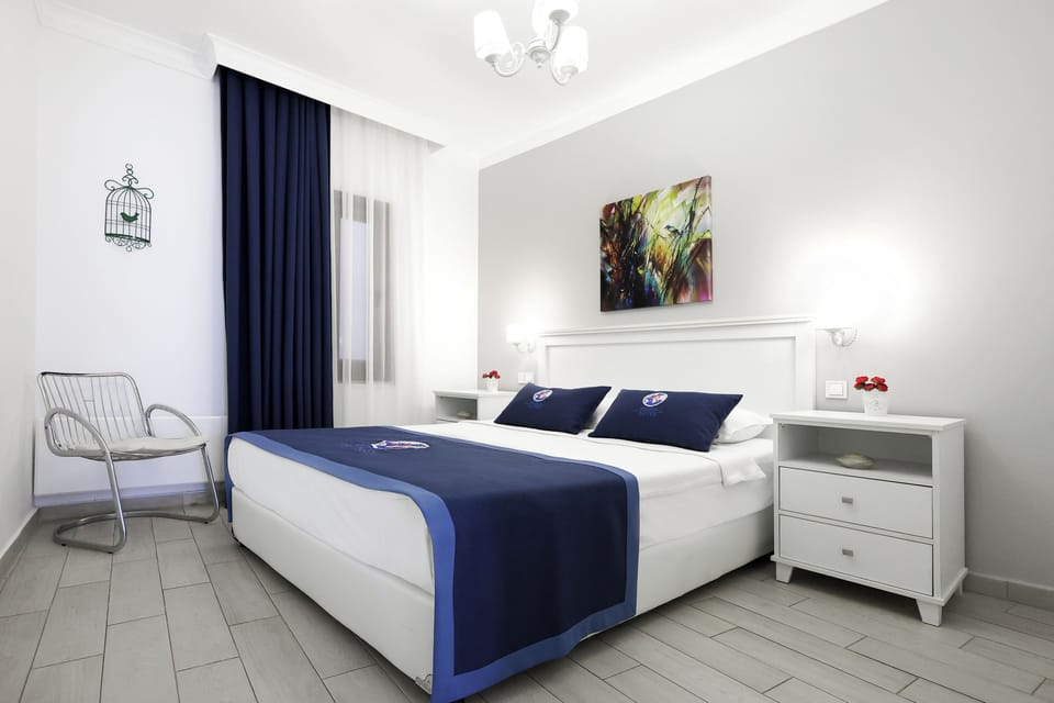 Hypo-allergenic bedding, down comforters, pillowtop beds, in-room safe