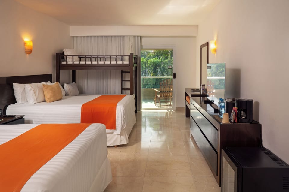 Family Room | Free minibar, in-room safe, blackout drapes, soundproofing