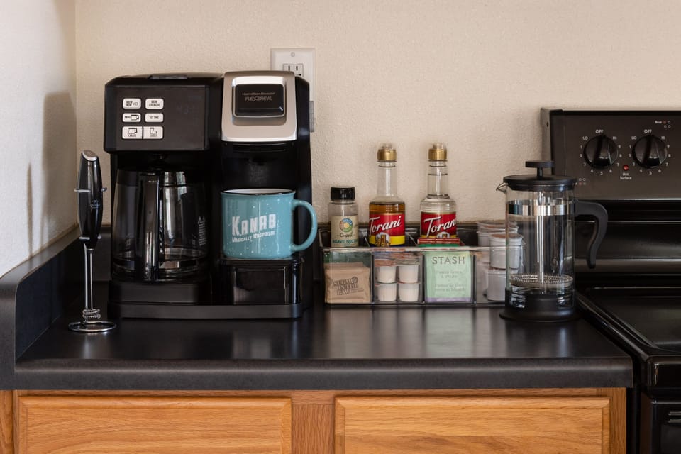 Start your day right! Our coffee/tea station is stocked with everything you need for your perfect cup, including tea bags, coffee, and flavored syrups.