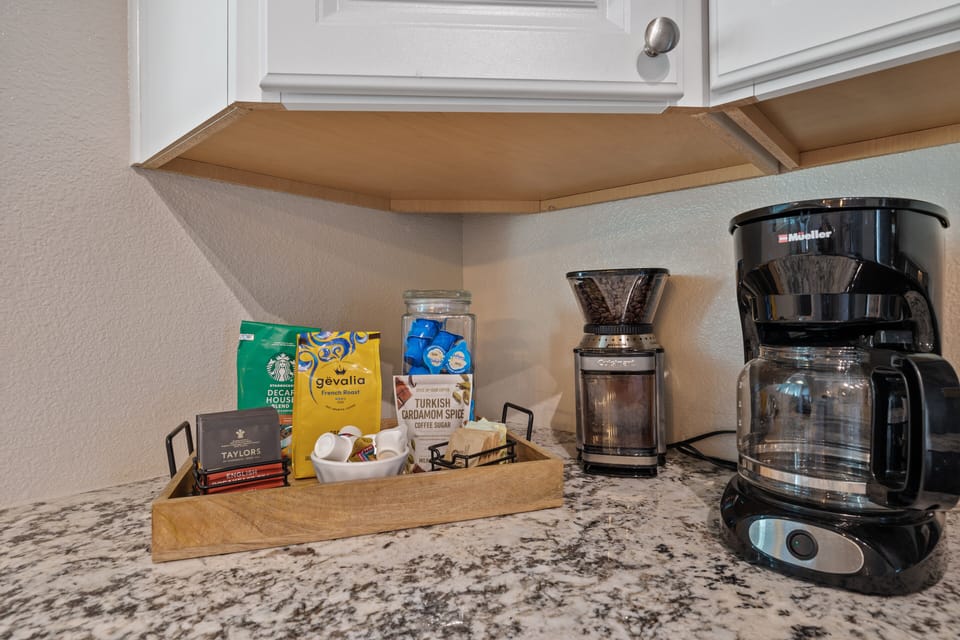 Drip coffee maker, French press, grinder, decaf, tea, creamers, stevia & sugar.
