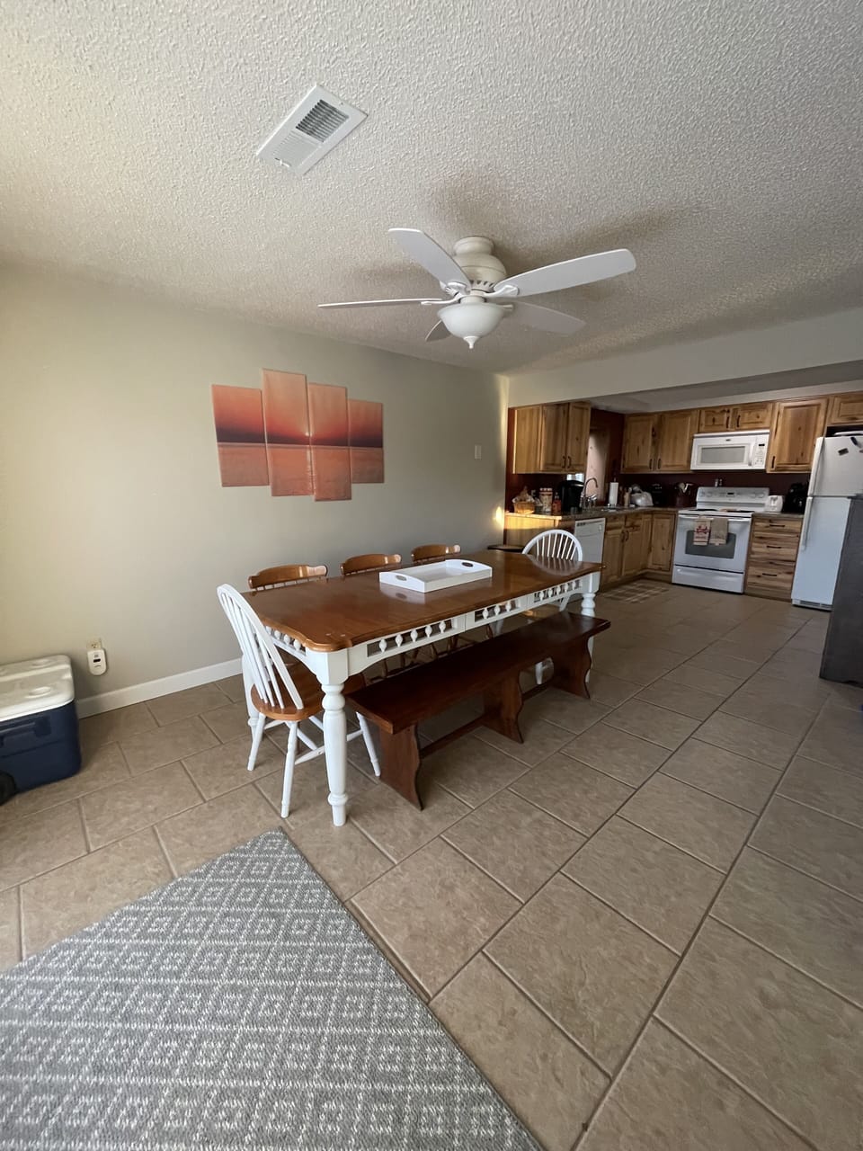 Full functioning kitchen off living room.