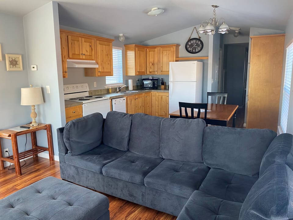 Comfort Cabin, 2 Bedrooms, Kitchen, Canal View | Living area | 50-inch LED TV with digital channels, TV