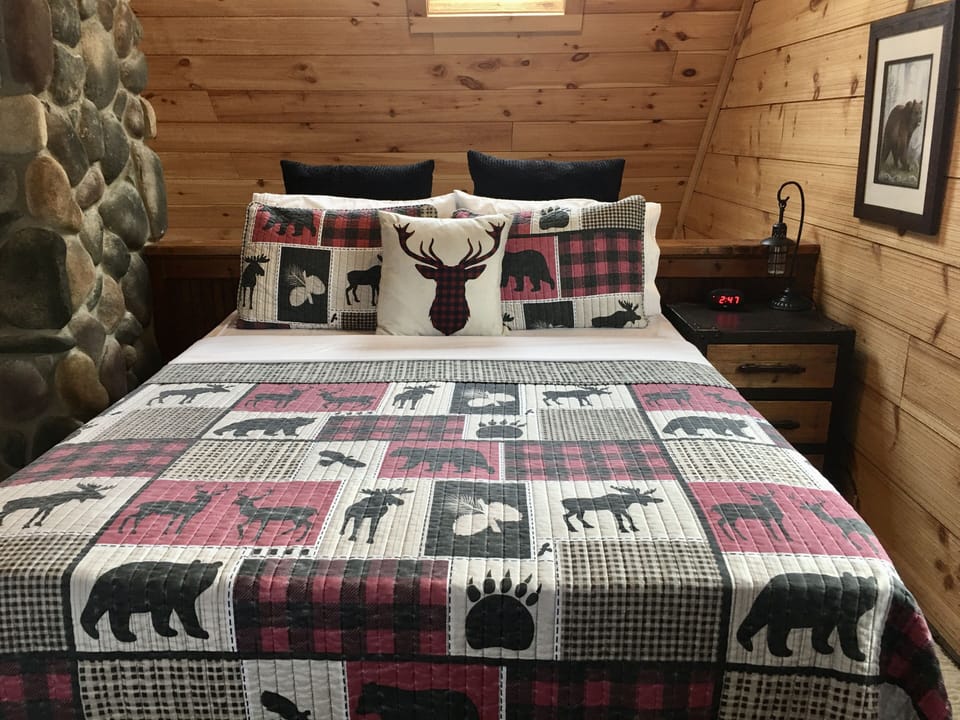 Queen bed with Serta Pillowtop mattress.