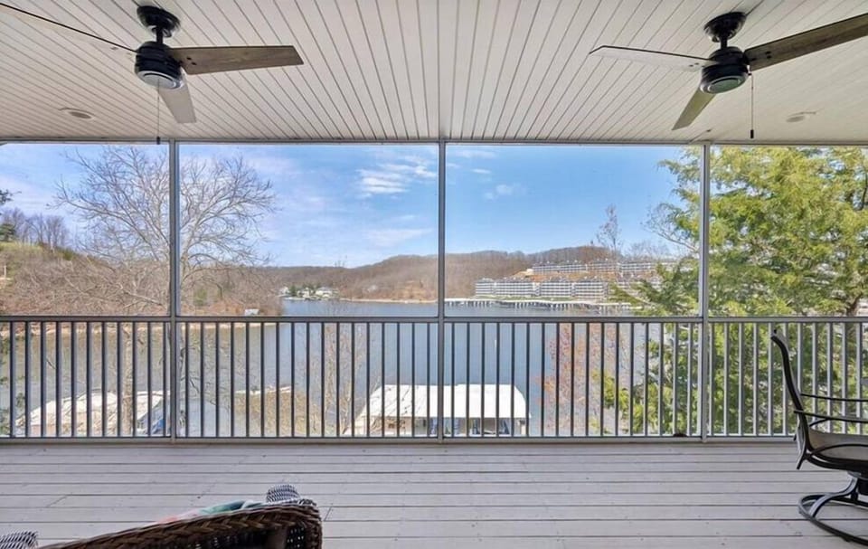 Upstairs Deck- completely screened in so you can enjoy the outdoors without the bugs!