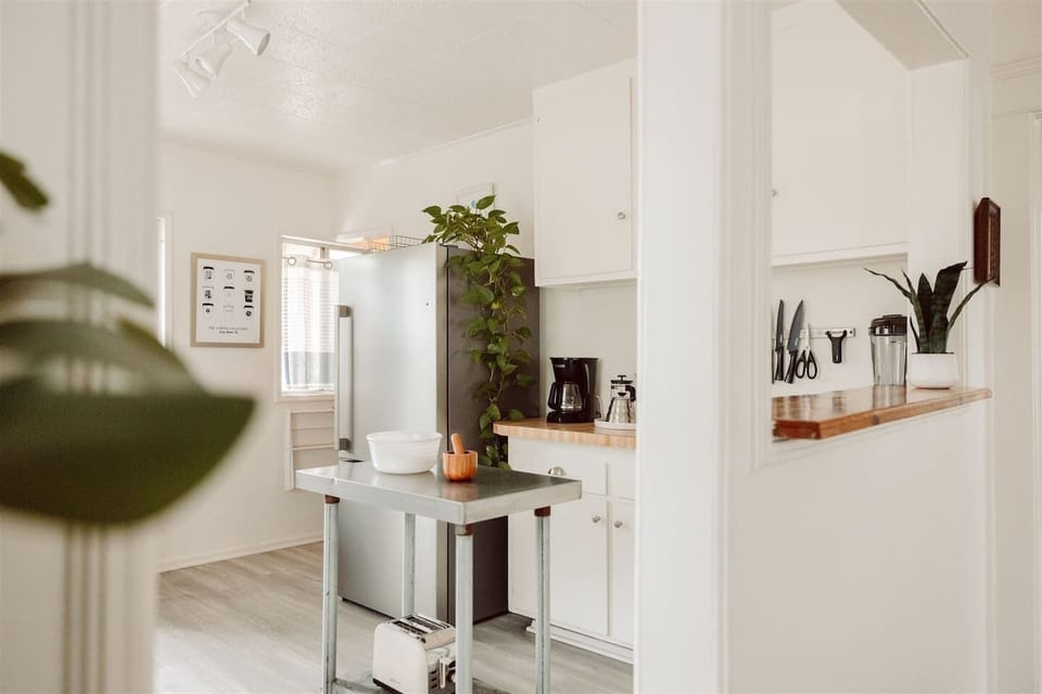 The kitchen is open to the dining and living area allowing connections between family and friends.