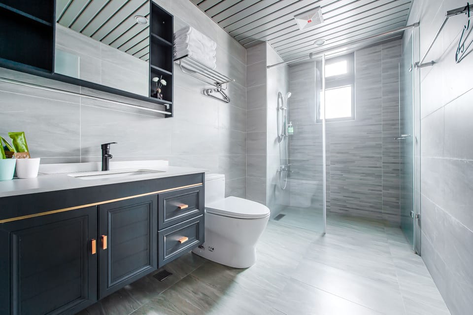 luxury apartment | Bathroom | Rainfall showerhead, free toiletries, hair dryer, slippers