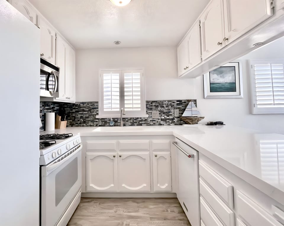 Spacious, fully stocked kitchen with everything you need—cookware, condiments, and a coffee station included!