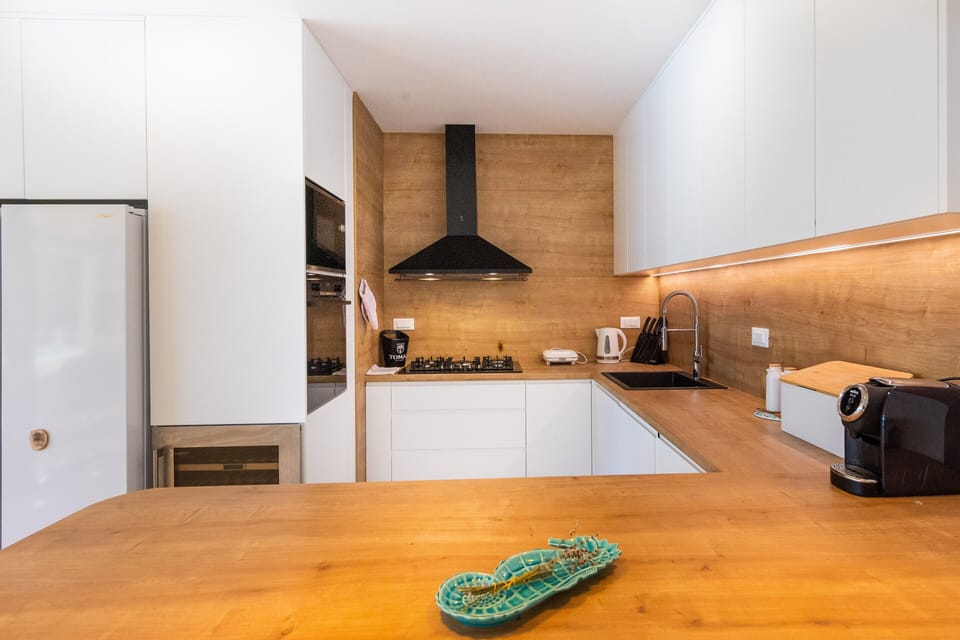 Exclusive Villa | Private kitchen | Shared fridge, microwave, espresso maker, coffee/tea maker