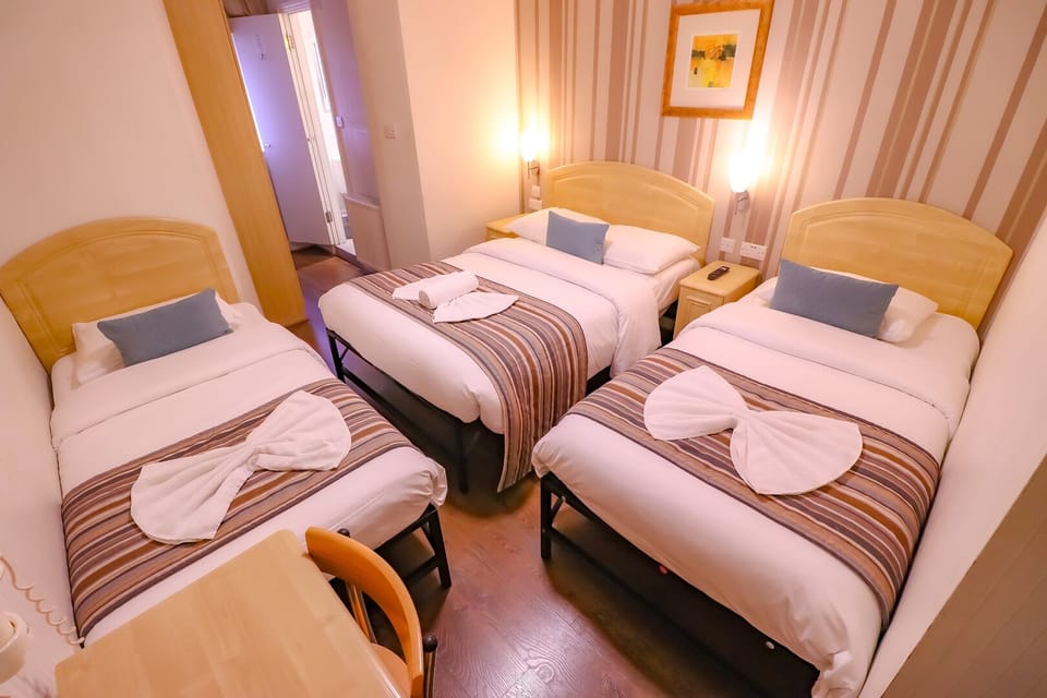 Standard Quadruple Room, Ensuite | Desk, laptop workspace, iron/ironing board, free WiFi