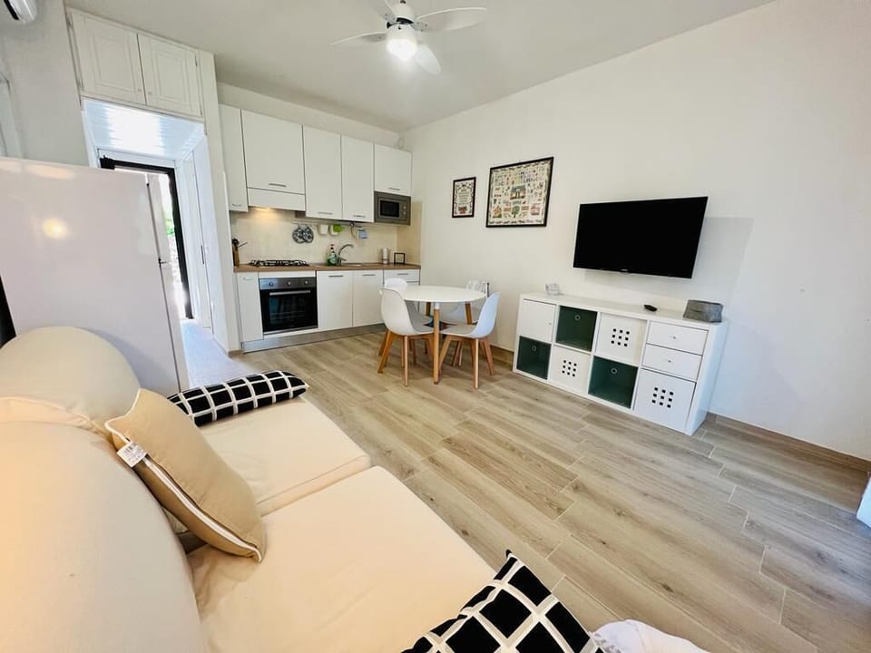 Apartment | Living area | 22-inch flat-screen TV with cable channels, TV