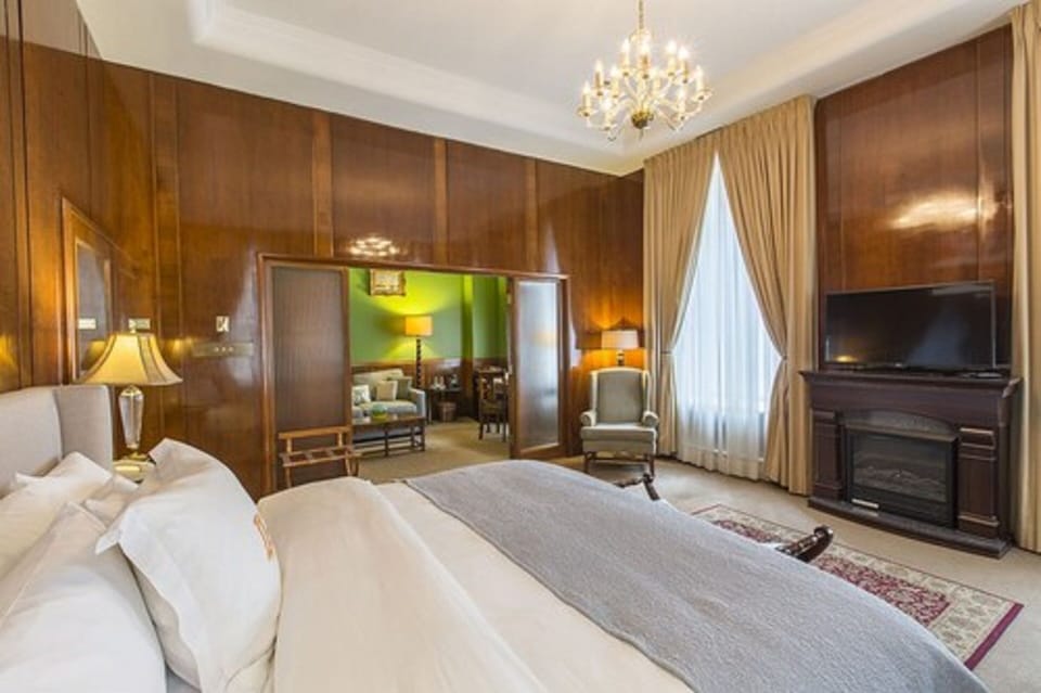 King Suite  | Premium bedding, down comforters, in-room safe, individually decorated