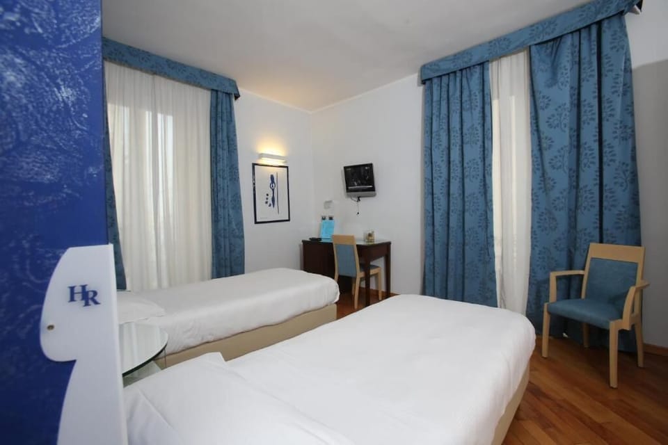 Basic Quadruple Room | Frette Italian sheets, premium bedding, in-room safe, desk