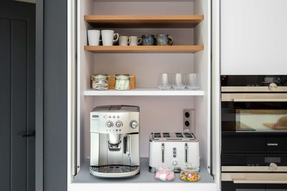 Mellita Bean to Cup coffee machine for amazing Espresso and Cappuccino with Italian Lavazza beans and Nespresso with DeCaf pods. I've also left you a range of herbal and English breakfast teas and some naughty treats too !