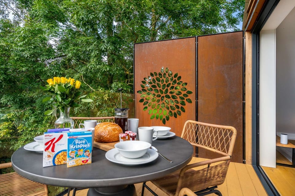 Breakfast is provided and enjoying it on the dining terrace on a sunny day is one of life's simple pleasures.