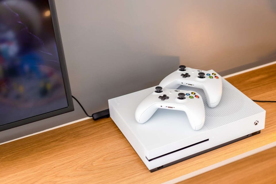 Xbox loaded with Games and two controllers
