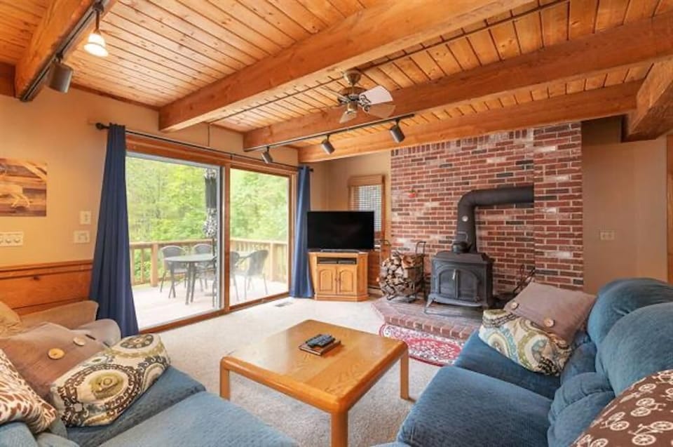 Living room with view to deck.