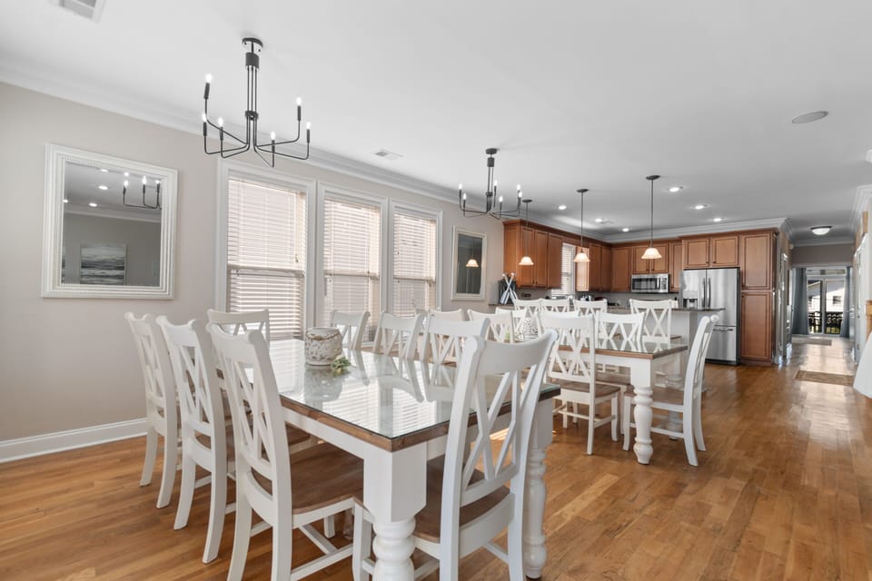 Gather your group around this spacious dining table with seating for twelve, perfect for memorable meals together.