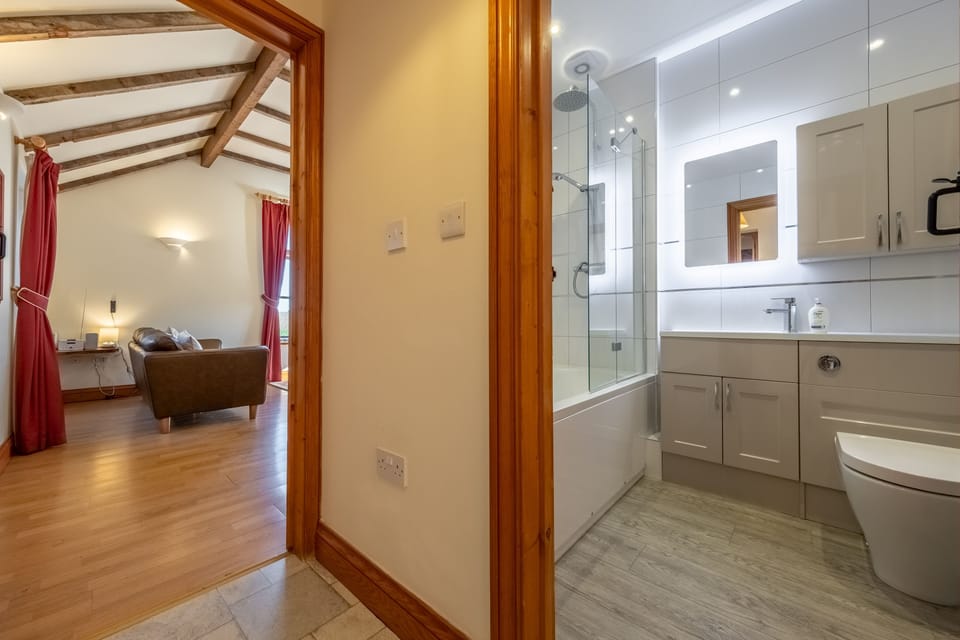 To the bathroom