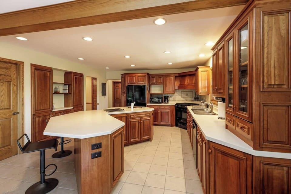 Cook up a great meal in the kitchen on the main level.  Enjoy snacks and conversation around the awesome kitchen island.
