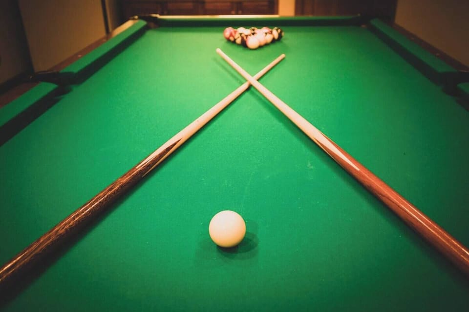 Let your competitive spirit run free with the pool table or ping pong table in the lower level common space.  Keep track of who's winning with the huge chalkboard that's fun for all.  Or make a drink at the wet bar.
