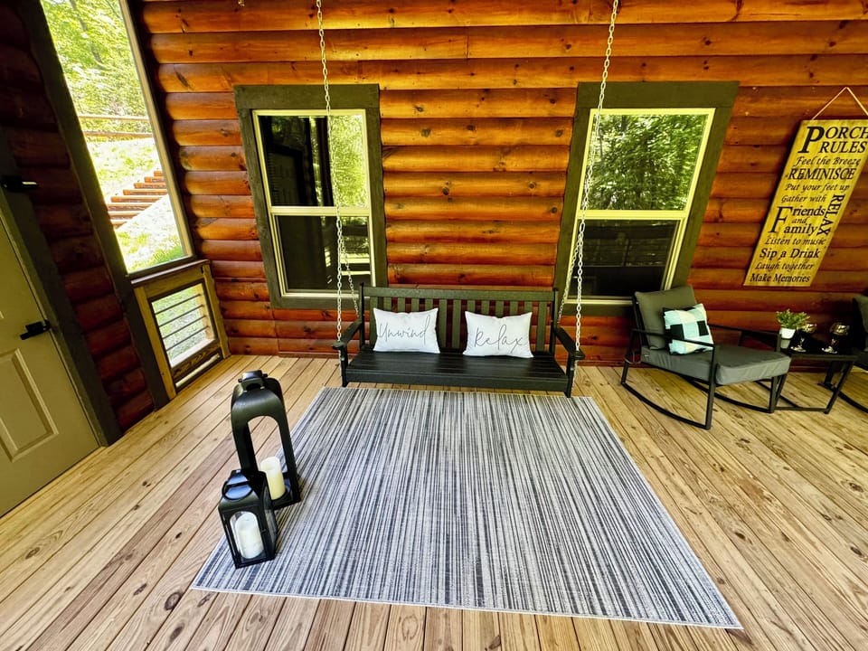 Lower Level Screened in Deck with Bench Swing, 43" Smart Tv, 2-Rockers and Alexa