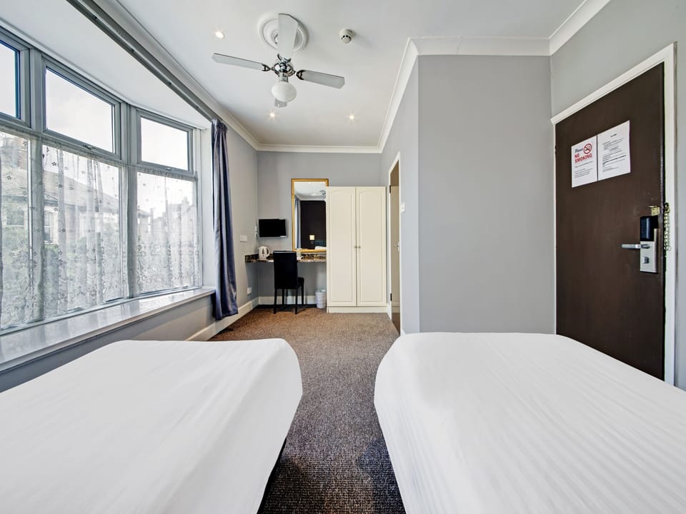 Standard Twin Room, 2 Twin Beds | Iron/ironing board, free WiFi, bed sheets