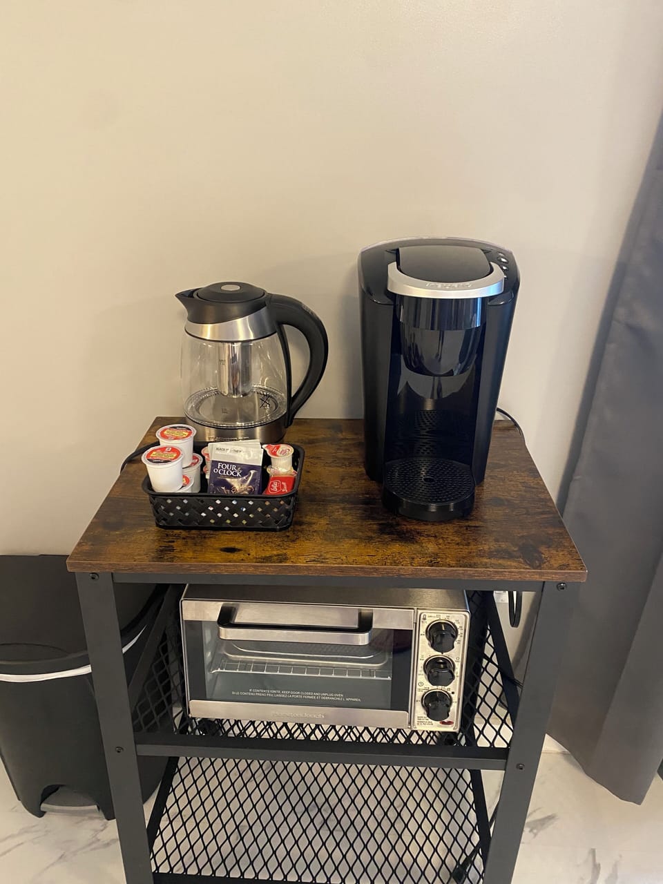 Coffee bar- Keurig, kettle, coffee pods, tea bags, sugar, sweetener, and cream.