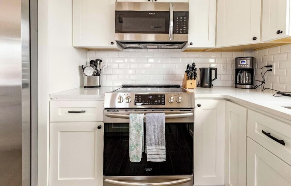 Fully stocked kitchen with coffee maker, kettle , and all you need 