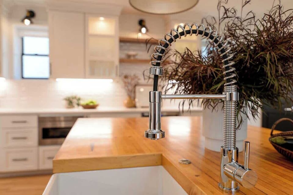 Stylish faucet installed in a well-maintained area, combining practicality with a clean and refreshing look.